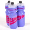 Purple water bottle with hot pink imprint. Alternate Cuyuna Igniter logo placed across the water bottle. Registered tagline "Tall green trees. Clear blue lakes. Red dirt trails." Imprinted in hot pink across the top of the water bottle neck. Water bottle cap is clear.