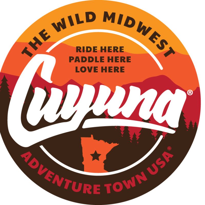 Circular sticker featuring the colors of gold, orange, red, and brown.