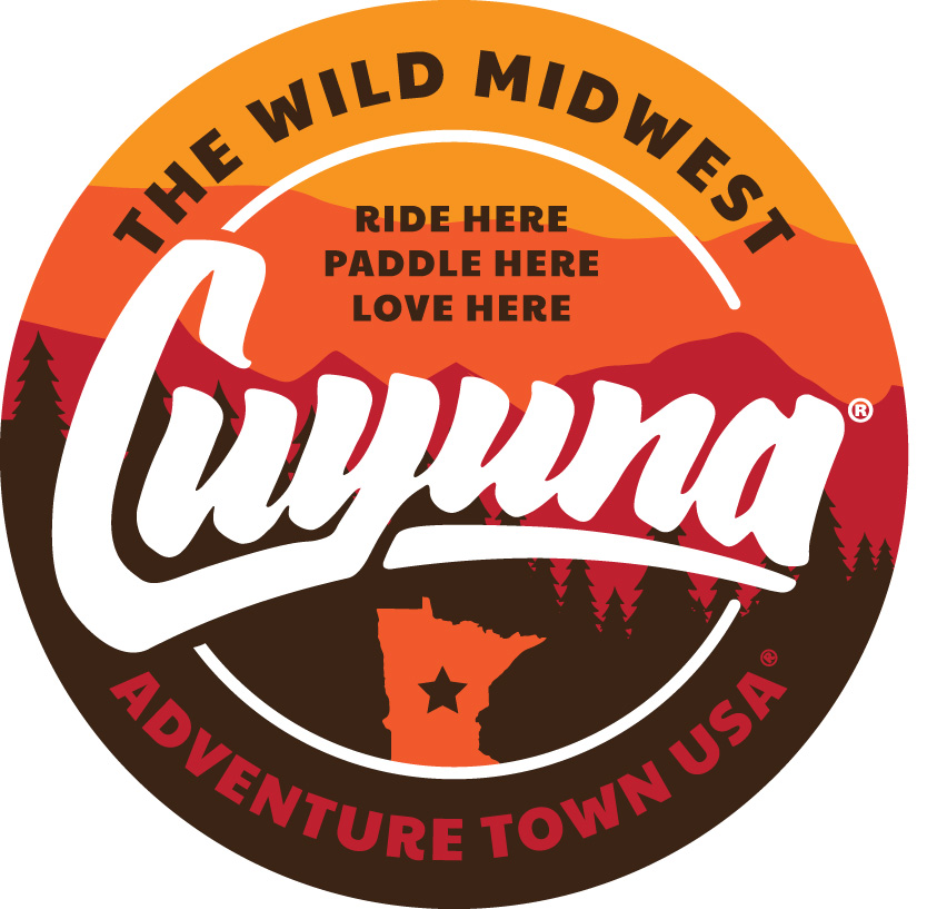 Circular sticker featuring the colors of gold, orange, red, and brown.